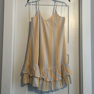 Nine Britton size medium.  Yellow and blue sun dress.